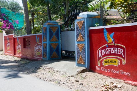 Advertisements for Kingfisher, the most popular beer.  While the beer itself isn't nationalized, all alcohol sales in Kerala are public.  