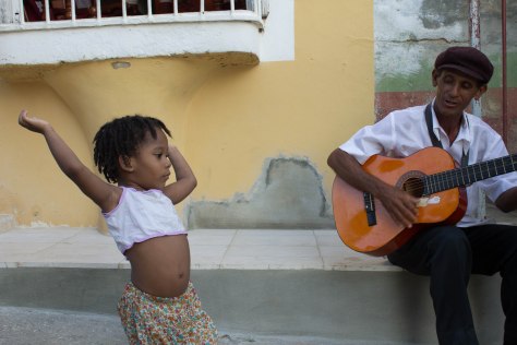 A girl dances to guitar in Trinidad.  I'm feeling like her after hearing this news!